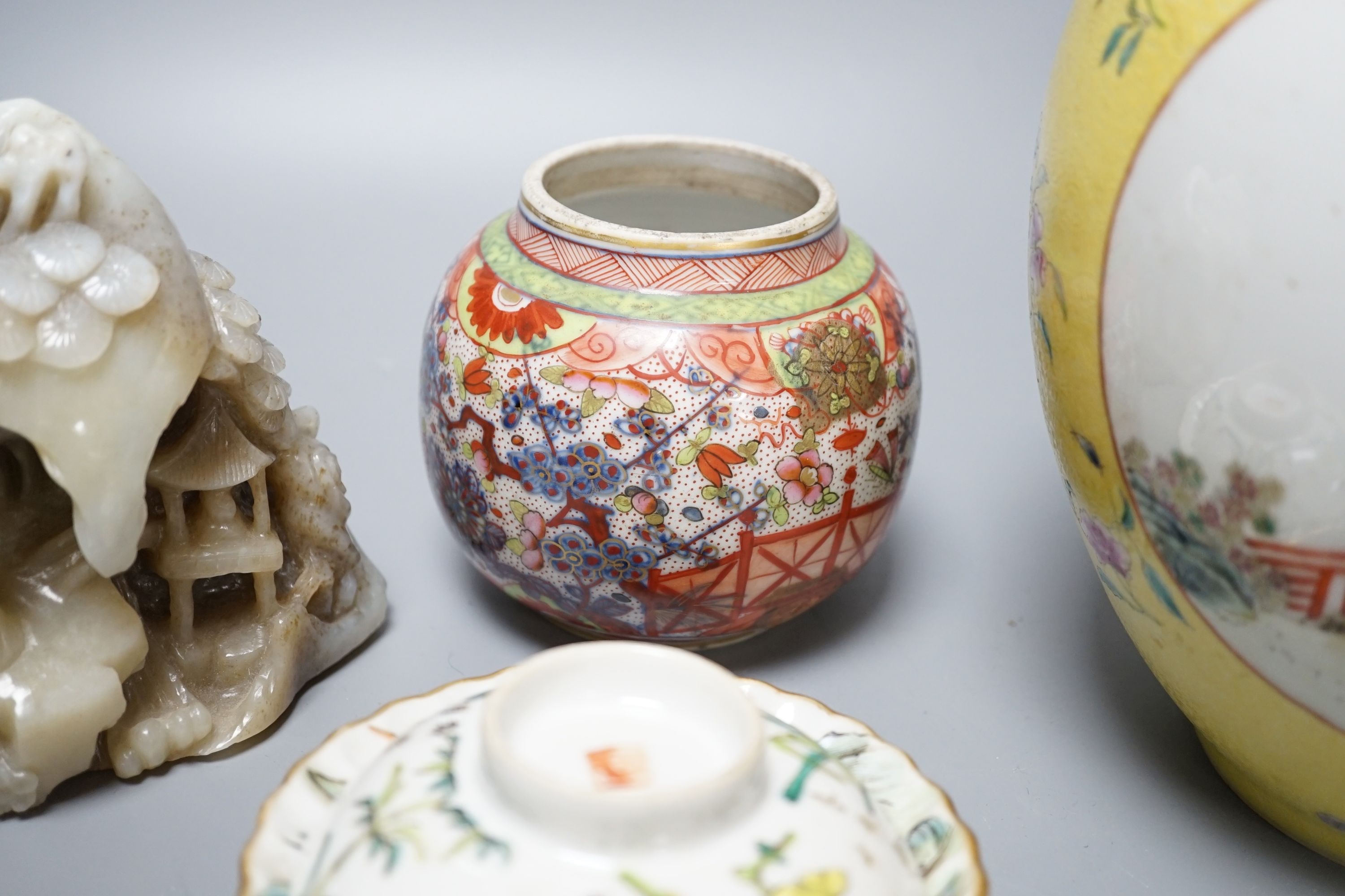 A mountain jade sculpture, 12cm high, together with other Chinese ceramics